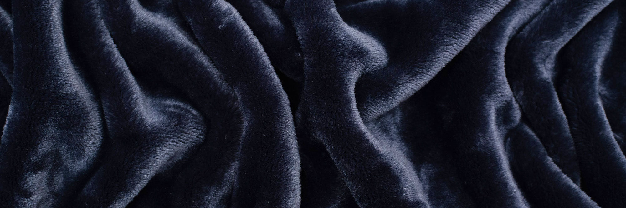 A Close up of our premium atlantic blue luster loft fleece blanket - American Blanket Company