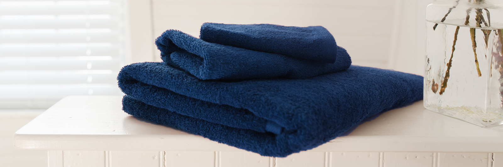 American Blanket Company - Blue Cotton Spa Towels on counter