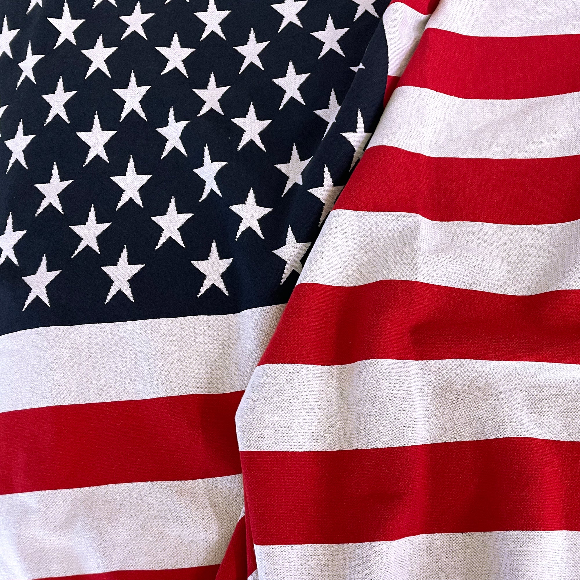 AMERICAN BLANKET COMPANY - KNITTED FLAG BLANKETS - Close up of the knitted and textured fabric.