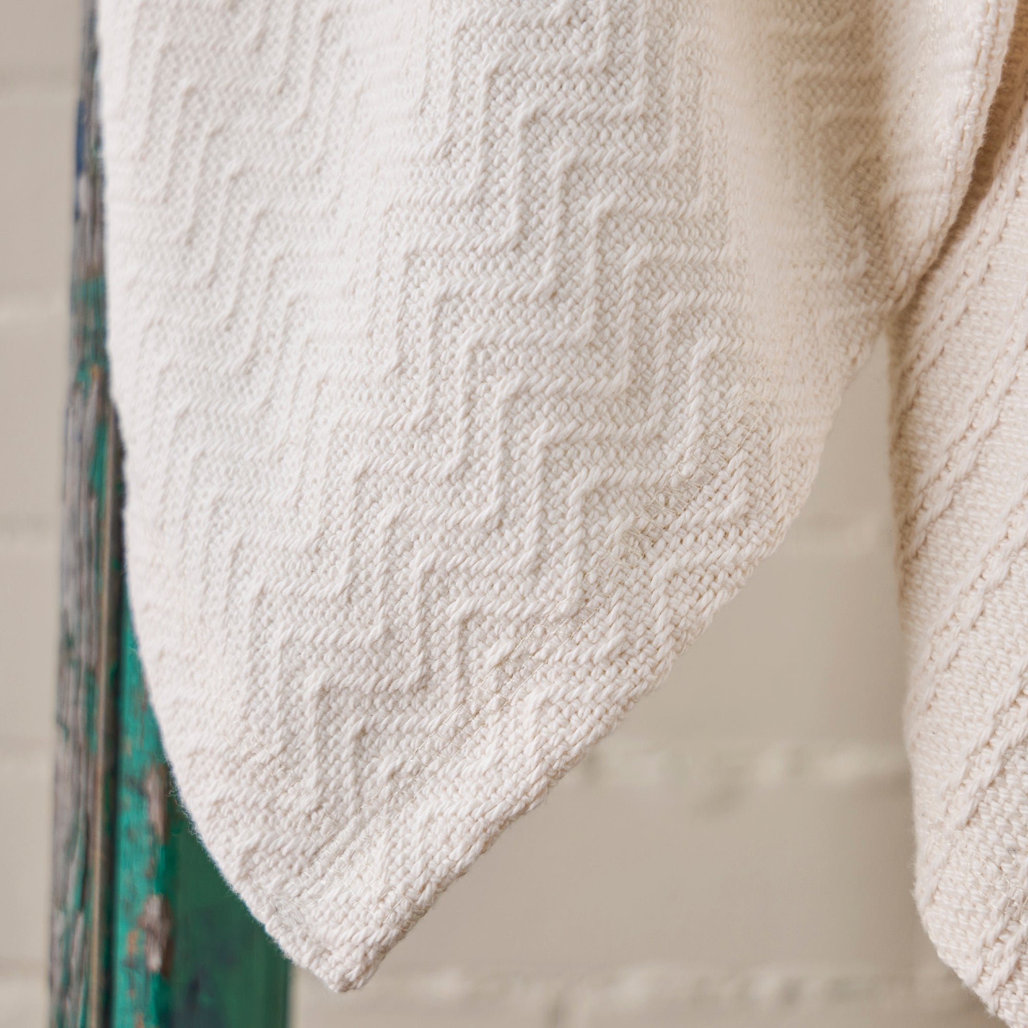 American blanket company - Chevron Weave Cotton blankets - Close up of a cream colored cotton chevron blanket