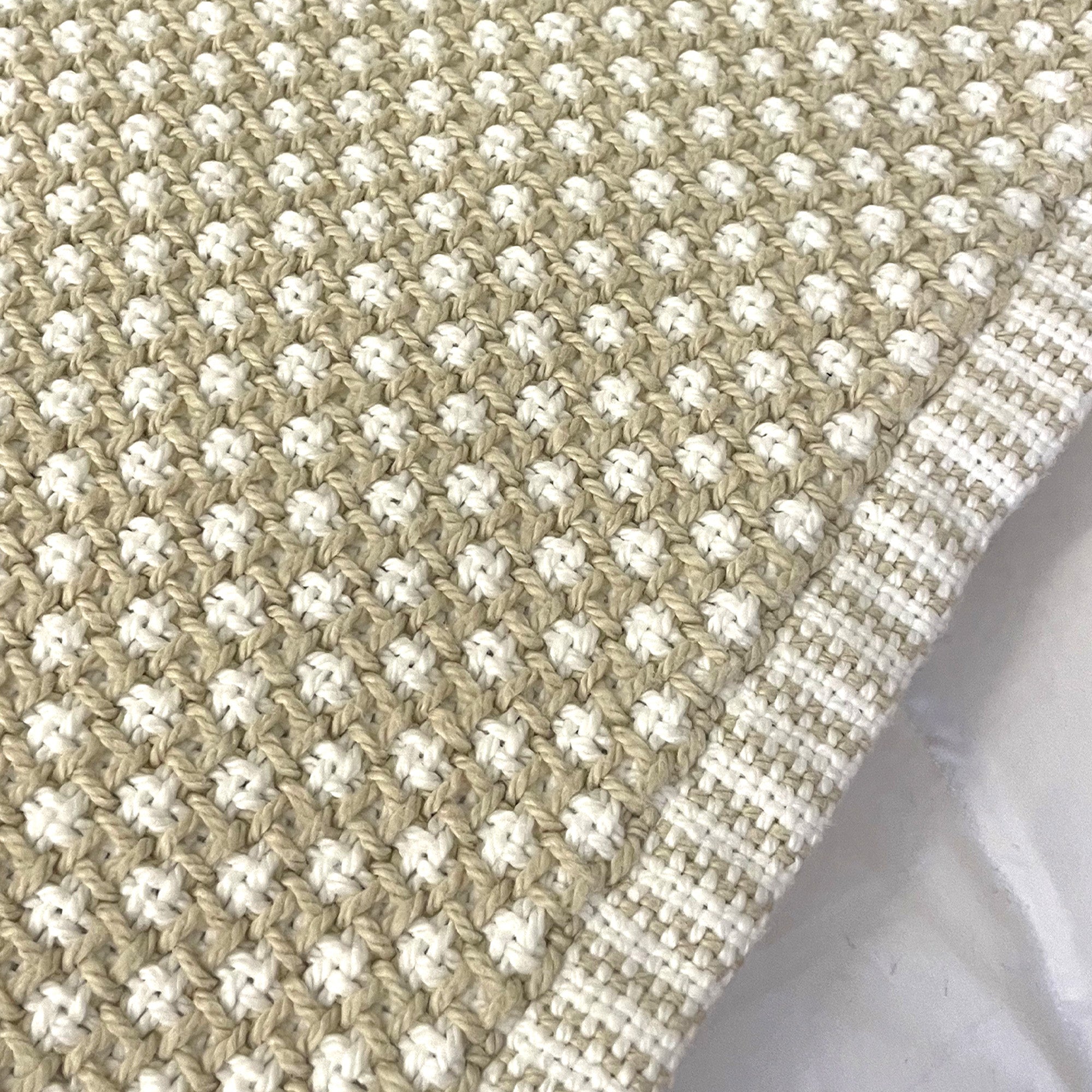 American Blanket Company - Cotton Blanket, 100% Cotton Lattice Weave Blanket - Close up of the natural and white woven pattern, with the woven hemmed edge