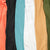 Tangerine, Black, light blue, brown, and olive fleece colors