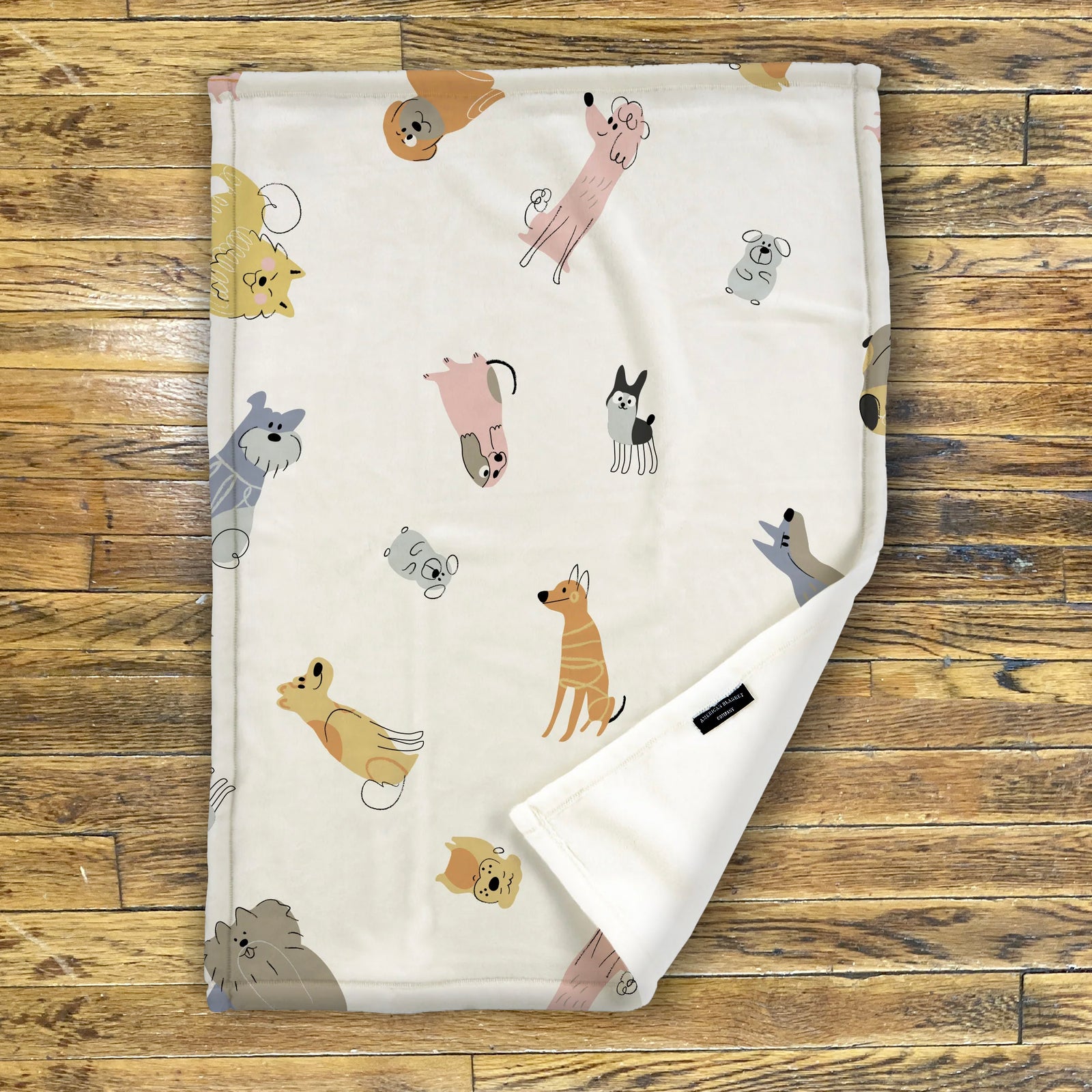 American Blanket Company - Luster Loft -A printed fleece baby blanket with various cartoon animals displayed across the fabric.