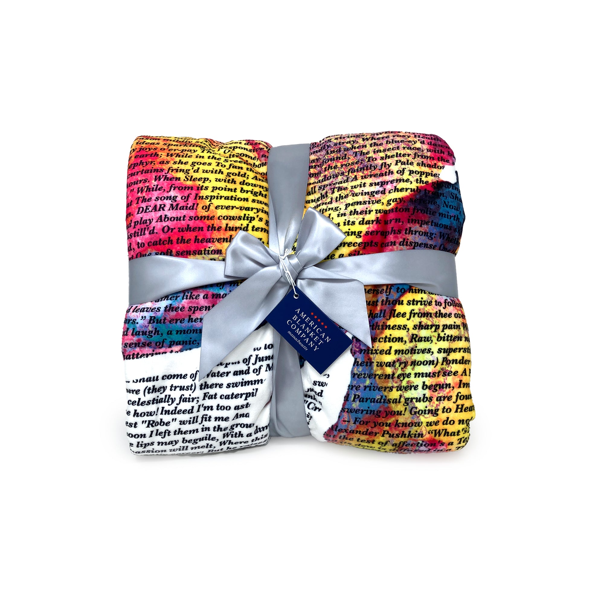 American Blanket Company - Butterfly Printed inspirational poem blanket - Folded detail shot of the vibrant butterfly blanket, tied with a ribbon and a hangtag.