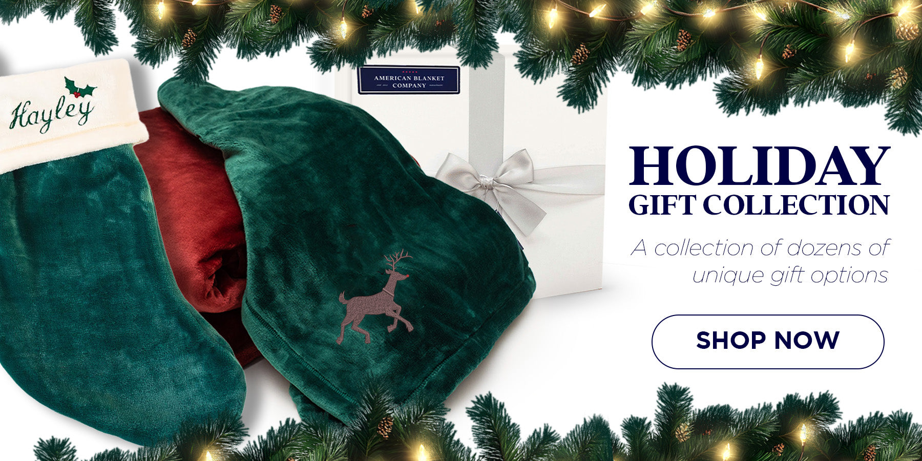 AMERICAN BLANKET COMPANY - Green Luster Loft  blanket with a deer design on a white background with Christmas decorations.