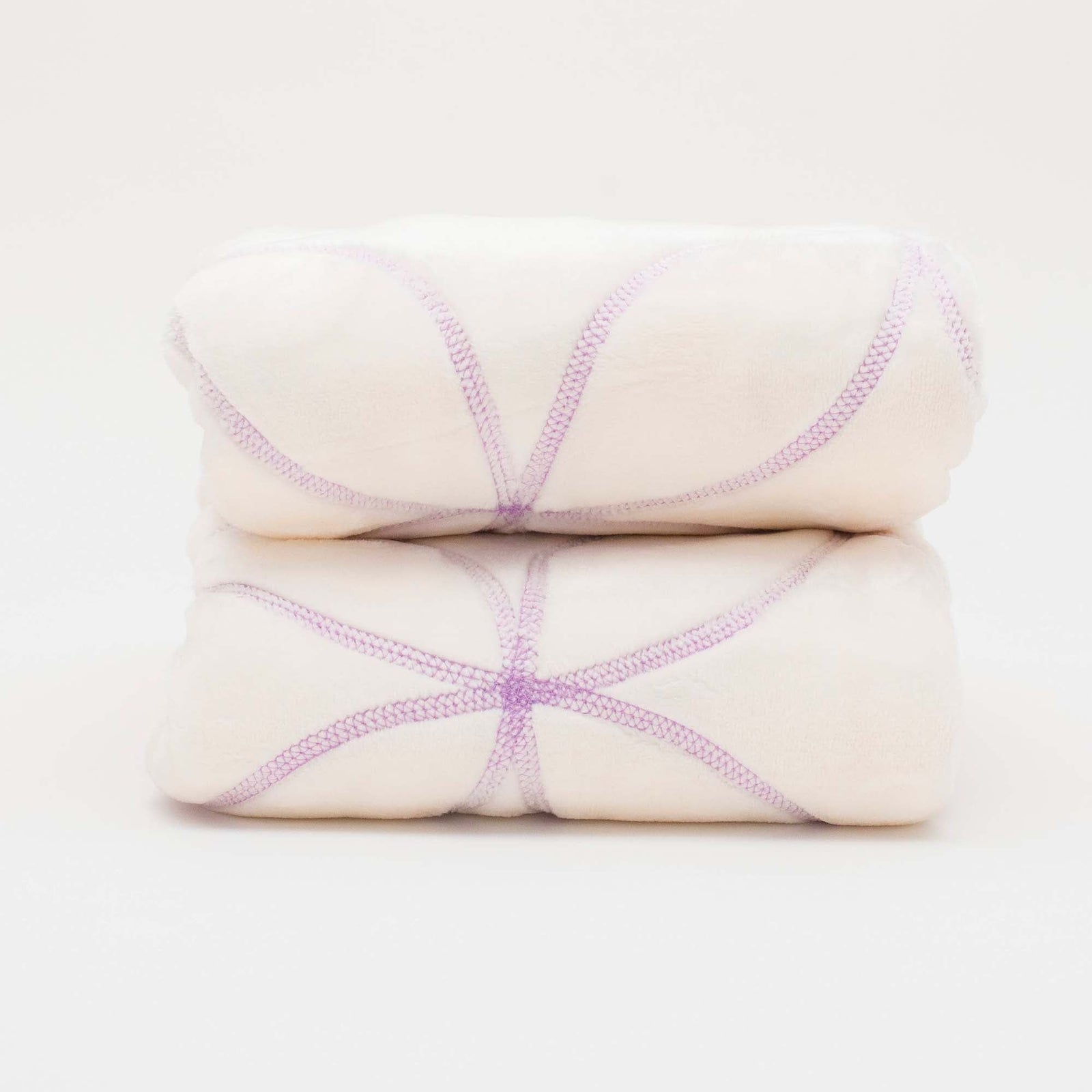 American Blanket Company - Luster Loft Baby Blanket Quilt- Gardenia on Luster Loft Fleece quilt stack