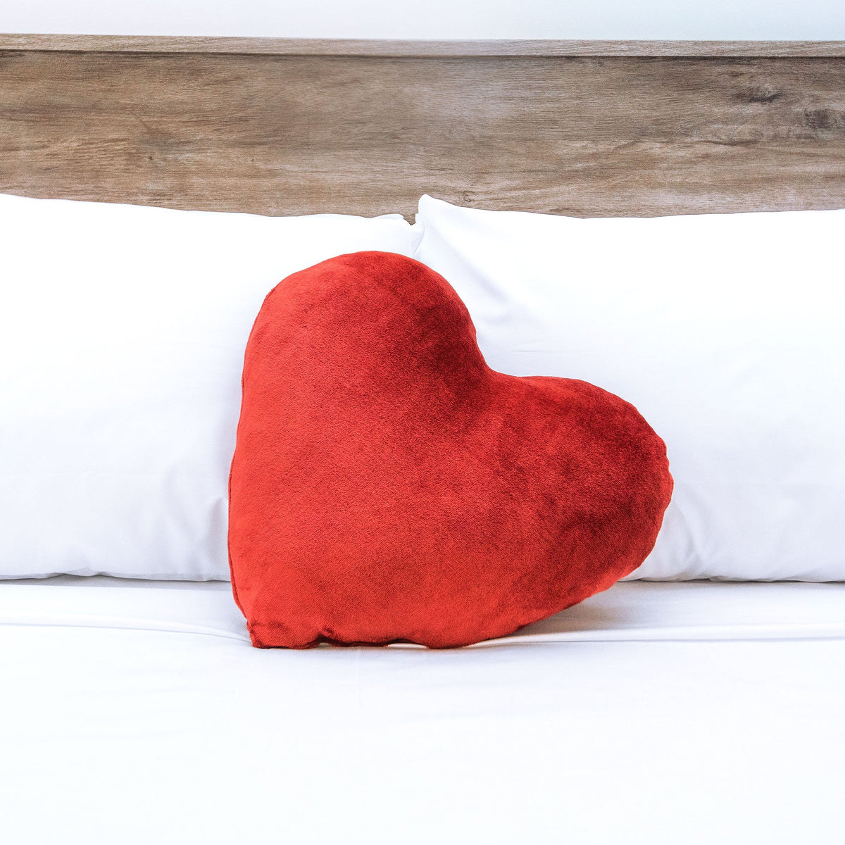 red heart pillow fleece heart pillow on bed - luster loft fleece heart pillow - Luster Loft Fleece - American Blanket Company