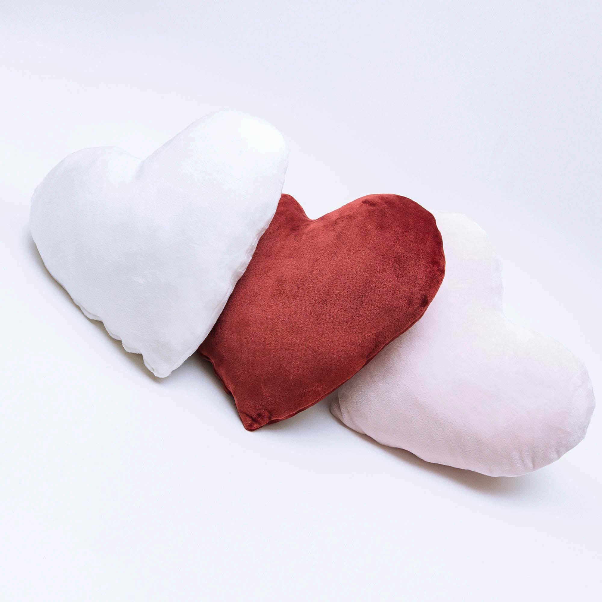 Trio Of Luster Loft Fleece heart pillows in white, red, and pale pink - luster loft fleece heart pillow - Luster Loft Fleece - American Blanket Company
