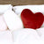 trio of fleece heart pillows on bed - luster loft fleece heart pillow - Luster Loft Fleece - American Blanket Company