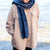 Woman in beige coat wearing luster loft fleece scarf - Luster Loft Fleece Scarf - American Blanket Company