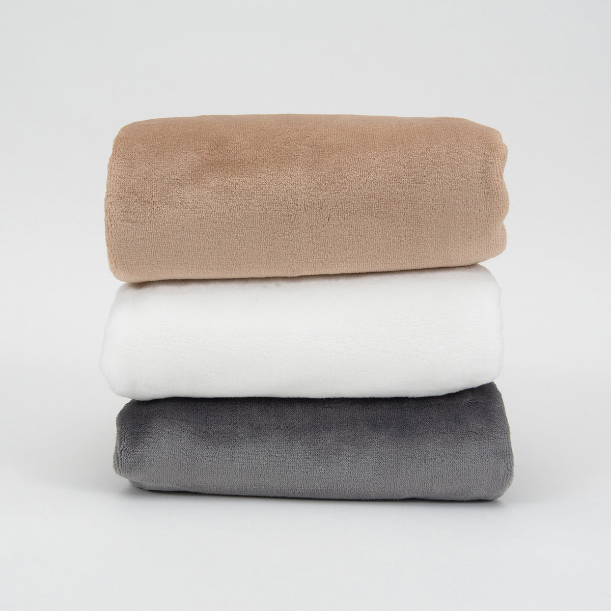 Stack of Luster Loft Fleece Blankets in Latte, Pure White, and Charcoal - Luster Loft Fleece Blankets - Luster Loft Fleece Throws - American Blanket Company