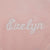 white embroidery of the name Evelyn on pink luster loft fleece - Luster Loft Fleece Blankets - Luster Loft Fleece Throws - American Blanket Company